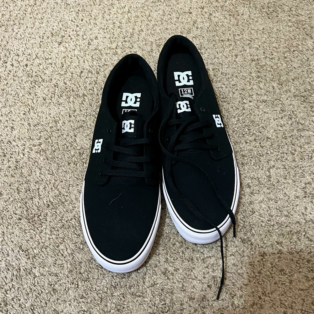 Black/White D.C. Shoes size 12M. Brand new never worn. No box.